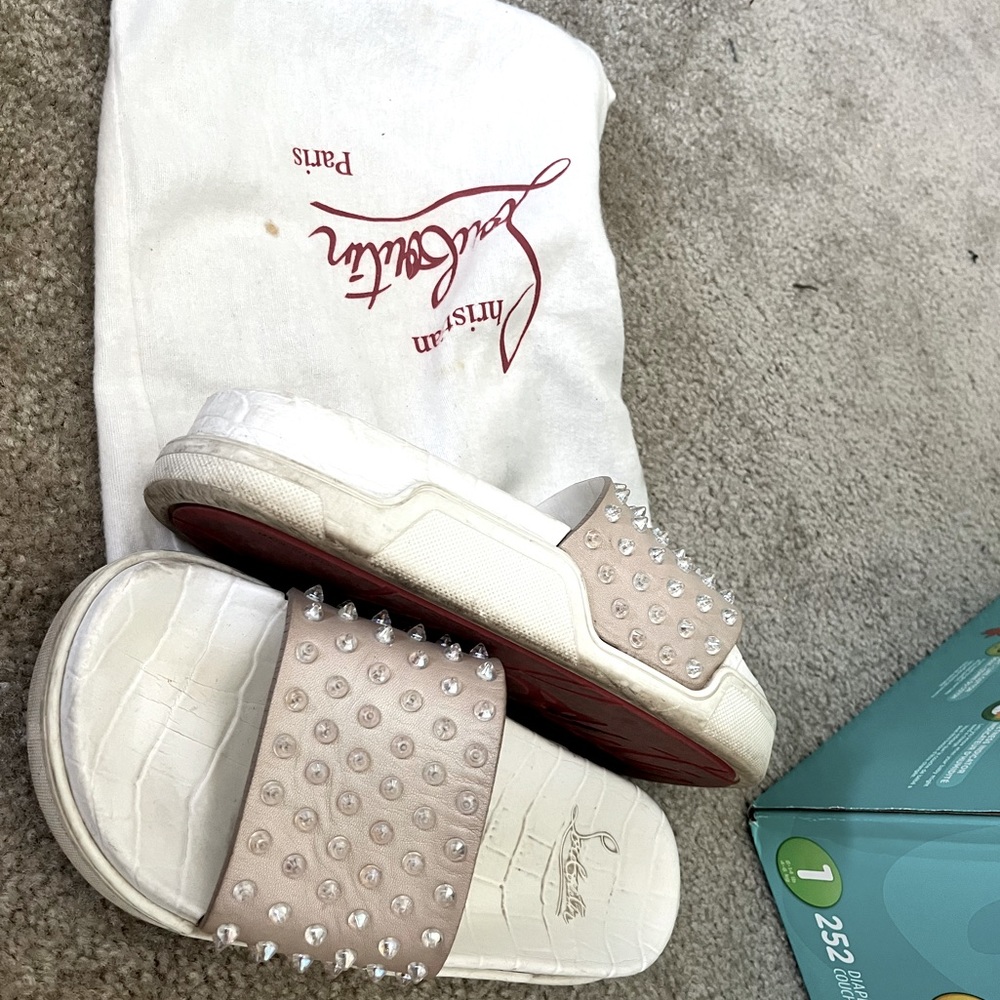 Louboutin  spiked slides, I’m a 9 and they fit me but they are a size 10